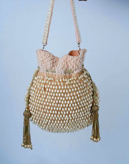 Buy Nayaab By Sonia Pink Pearls, Beads Tassel Blush Potli Bag Buy_Nayaab By Sonia_Pink Pearls, Beads Tassel Blush Potli Bag