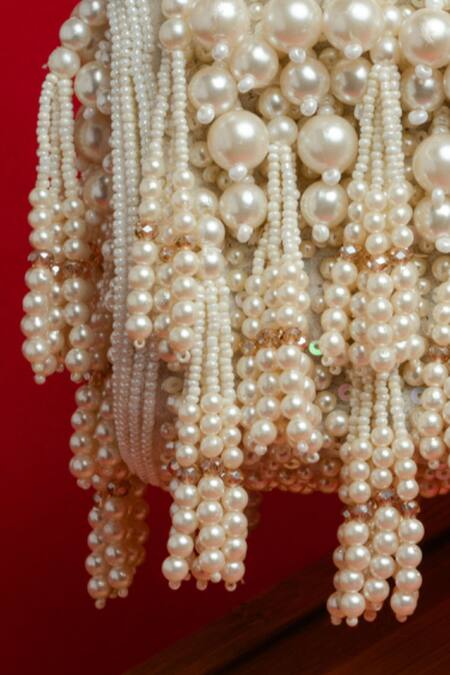 Nayaab By Sonia White Pearls, Tassels Velvet Box Clutch Online at Aza Fashions Nayaab By Sonia_White Pearls, Tassels Velvet Box Clutch _Online_at_Aza_Fashions