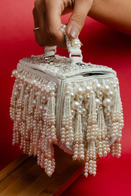 Buy Nayaab By Sonia White Pearls, Tassels Velvet Box Clutch Online at Aza Fashions Buy_Nayaab By Sonia_White Pearls, Tassels Velvet Box Clutch _Online_at_Aza_Fashions