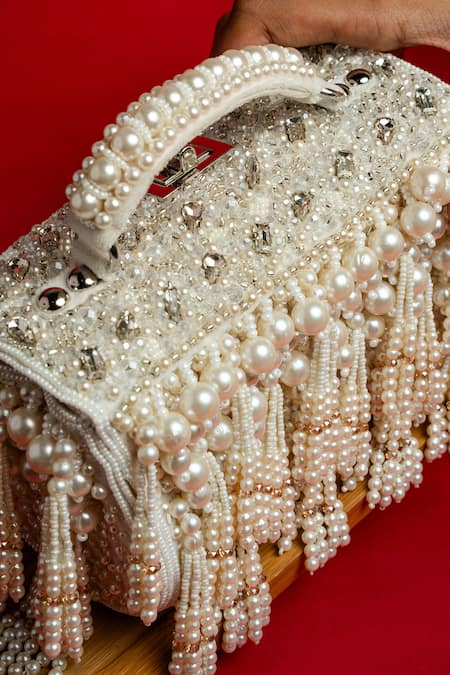 Nayaab By Sonia White Pearls, Tassels Velvet Box Clutch at Aza Fashions Nayaab By Sonia_White Pearls, Tassels Velvet Box Clutch _at_Aza_Fashions