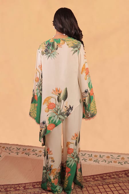 Shop Surkh Syahi Off White Cotton, Muslin Beads V-neck Kokum Asymmetric Tunic Co-ord Set at Aza Fashions Shop_Surkh Syahi_Off White Cotton, Muslin Beads V-neck Kokum Asymmetric Tunic Co-ord Set _at_Aza_Fashions