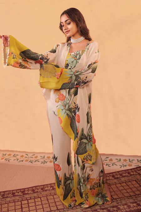 Surkh Syahi_Off White Cotton, Muslin V-, Round Kokum Asymmetric Tunic Co-ord Set _at_Aza_Fashions