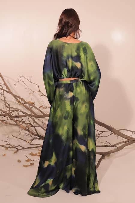 Shop Surkh Syahi Green Cotton, Silk Round Neck Jheel Slouch Crop Top And Flared Pants Set at Aza Fashions Shop_Surkh Syahi_Green Cotton, Silk Round Neck Jheel Slouch Crop Top And Flared Pants Set _at_Aza_Fashions