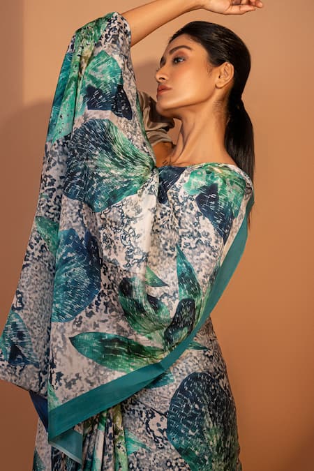 Unallume By Nisha_Turquoise Silk Orchid Dreams Printed Saree _Online_at_Aza_Fashions