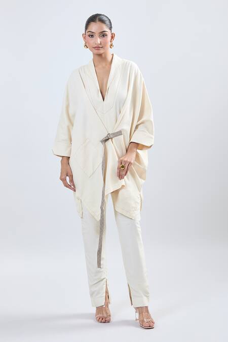 Shop Ott Ivory Cotton V-neck Asymmetrical Tunic With Belt Online at Aza Fashions Shop_Ott_Ivory Cotton V-neck Asymmetrical Tunic With Belt _Online_at_Aza_Fashions