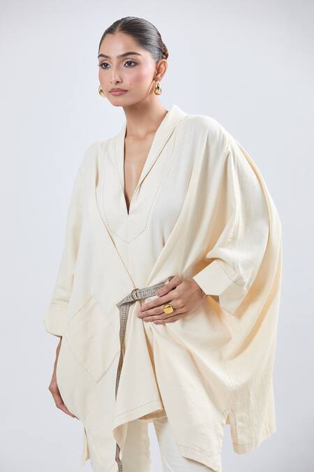 Ott Ivory Cotton V-neck Asymmetrical Tunic With Belt at Aza Fashions Ott_Ivory Cotton V-neck Asymmetrical Tunic With Belt _at_Aza_Fashions