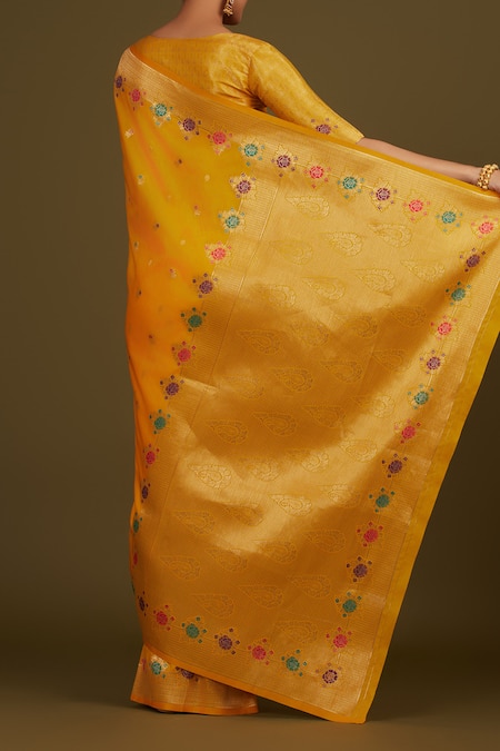 Shop_Naintara Bajaj_Yellow Brocade, Silk Zari Round Neck Woven Banarasi Satin Saree _at_Aza_Fashions