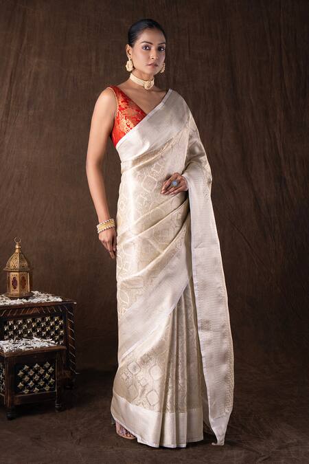 Zal From Benaras White Silk, Kota Doria Brooches Round Pure Katan Brocade Banarasi Saree Set at Aza Fashions Zal From Benaras_White Silk, Kota Doria Brooches Round Pure Katan Brocade Banarasi Saree Set _at_Aza_Fashions