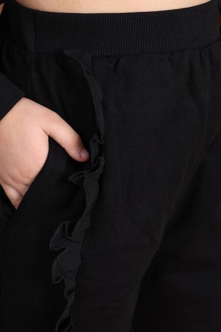 Petite Pomme_Black Cotton Ruffles Frilled Top And Jogger Set _at_Aza_Fashions