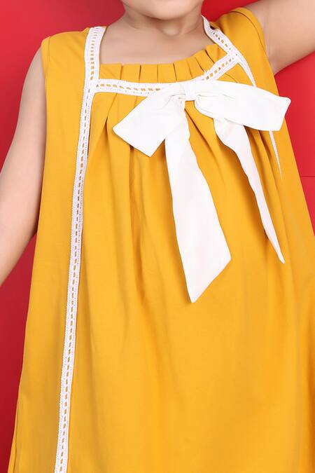 Petite Pomme_Yellow Cotton Bows, Lace Pleated Neckline Dress With Detail _at_Aza_Fashions