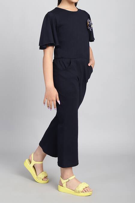 Shop_Petite Pomme_Blue Cotton Flared Sleeve Jumpsuit With Flower Detail _Online_at_Aza_Fashions