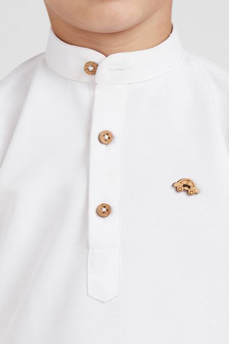 Shop Petite Pomme White Cotton, Linen Boys Short Kurta Set With Beige Pants Online at Aza Fashions Shop_Petite Pomme_White Cotton, Linen Boys Short Kurta Set With Beige Pants _Online_at_Aza_Fashions