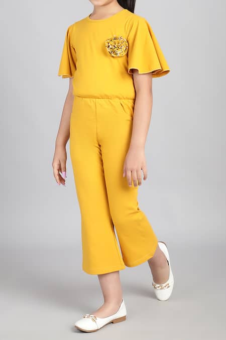Buy_Petite Pomme_Yellow Cotton Fabric Flowers Flared Sleeve Jumpsuit _Online_at_Aza_Fashions