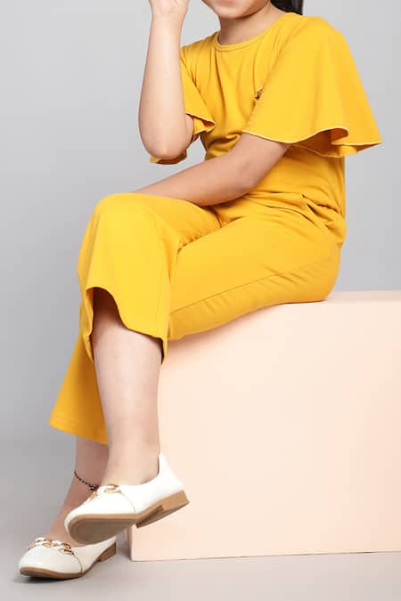 Shop_Petite Pomme_Yellow Cotton Fabric Flowers Flared Sleeve Jumpsuit _Online_at_Aza_Fashions