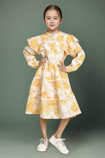 Buy Petite Pomme Mustard Cotton Floral Print Fit And Flare Dress at Aza Fashions Buy_Petite Pomme_Mustard Cotton Floral Print Fit And Flare Dress_at_Aza_Fashions