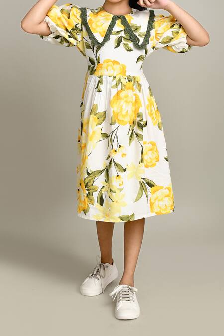 Petite Pomme_White Cotton Floral Fit And Flare Dress_at_Aza_Fashions