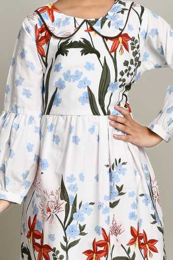 Petite Pomme_White Cotton Floral Print Fit And Flare Dress_at_Aza_Fashions
