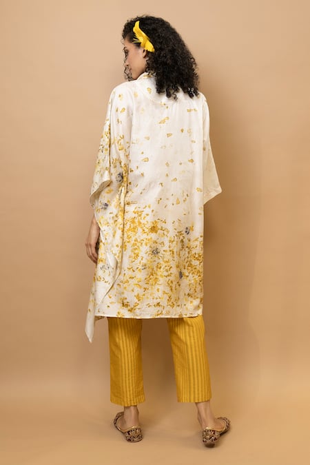Shop Krishna Mehta White Silk, Cotton One Shoulder Marigold Floral Collared Kaftan at Aza Fashions Shop_Krishna Mehta_White Silk, Cotton One Shoulder Marigold Floral Collared Kaftan _at_Aza_Fashions