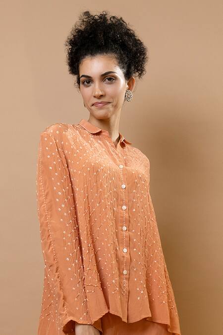 Krishna Mehta_Peach Silk, Modal Sequins Collared Bandhej Asymmetric Shirt Set_at_Aza_Fashions