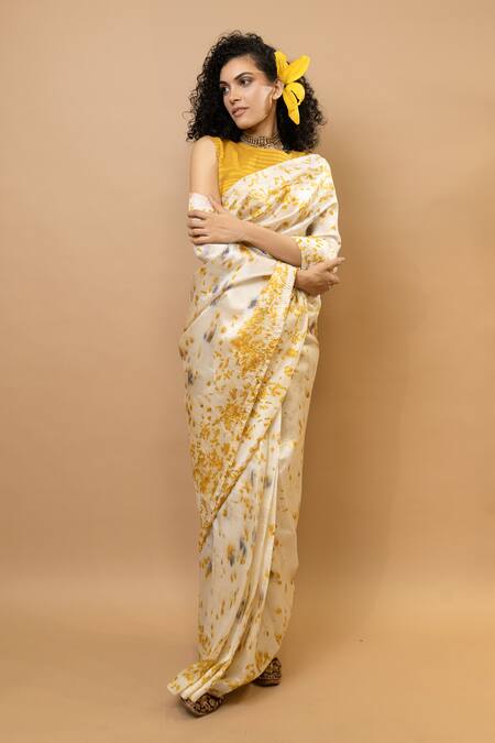 Buy Krishna Mehta Yellow Silk Round Neck Marigold Printed Saree With Blouse Online at Aza Fashions Buy_Krishna Mehta_Yellow Silk Round Neck Marigold Printed Saree With Blouse _Online_at_Aza_Fashions