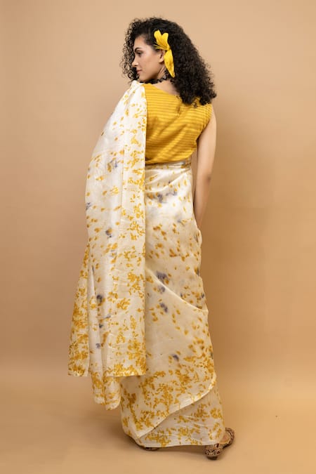 Shop Krishna Mehta Yellow Silk Round Neck Marigold Printed Saree With Blouse at Aza Fashions Shop_Krishna Mehta_Yellow Silk Round Neck Marigold Printed Saree With Blouse _at_Aza_Fashions