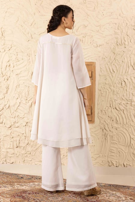 Shop Ajiesh Oberoi Ivory Georgette, Muslin Crystals Round Neck Applique Yoke Work Kurta Set at Aza Fashions Shop_Ajiesh Oberoi_Ivory Georgette, Muslin Crystals Round Neck Applique Yoke Work Kurta Set _at_Aza_Fashions
