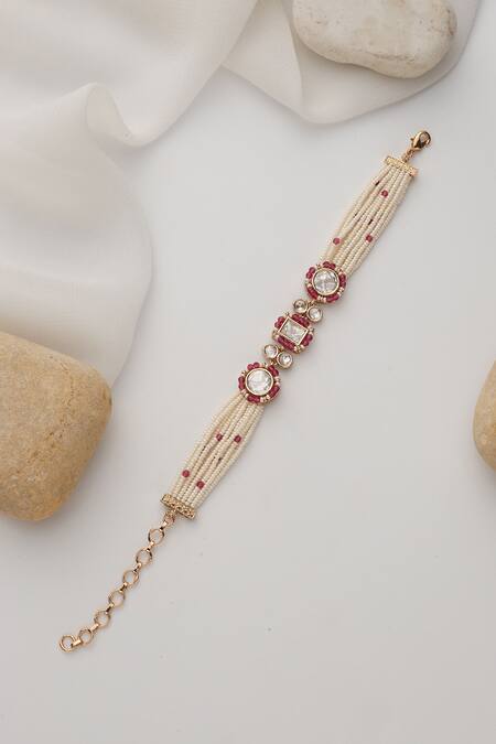 Shop Swabhimann Red Stones, Beads Rose Gold Polki Bracelet Online at Aza Fashions Shop_Swabhimann_Red Stones, Beads Rose Gold Polki Bracelet_Online_at_Aza_Fashions