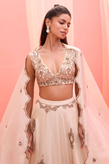 Vasavi Shah_Ivory Tissue Sequins, Embroidery V-neck Metallic Lehenga Set _Online_at_Aza_Fashions