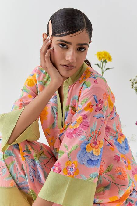 Chrkha_Peach Cotton, Linen Tassels Mandarin Collar Floral Printed Kurta Set _at_Aza_Fashions