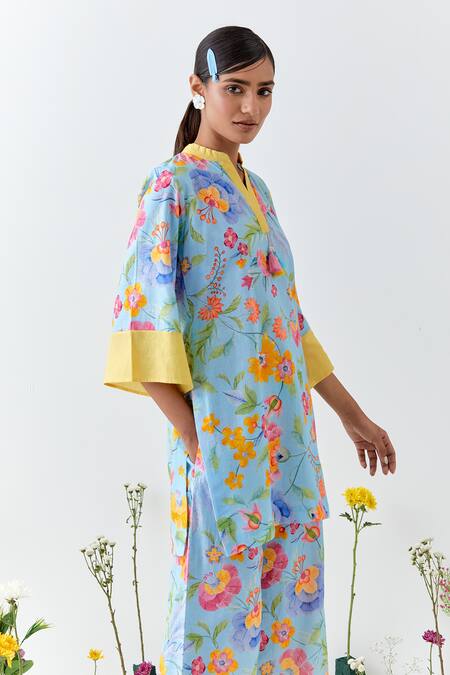 Chrkha_Blue Cotton, Linen Tassels Collared Floral Printed Kurta Set _at_Aza_Fashions
