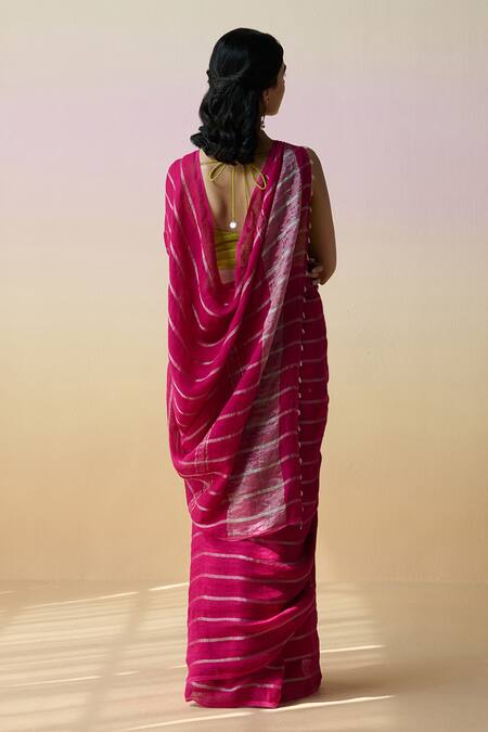 Shop Dressfolk Rose Gold Linen Handloom Rani Pink Saree With Running Blouse at Aza Fashions Shop_Dressfolk_Rose Gold Linen Handloom Rani Pink Saree With Running Blouse_at_Aza_Fashions