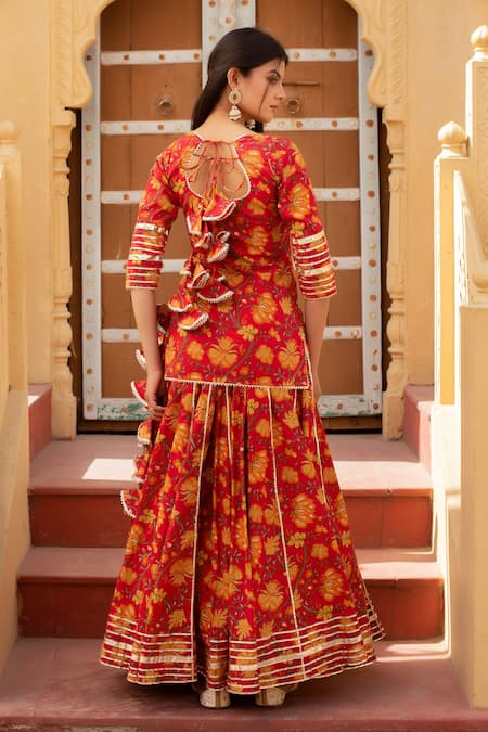 Shop Pomcha Jaipur Red Cotton, Net Ruffles Round Neck Printed Kurta Set With Dupatta at Aza Fashions Shop_Pomcha Jaipur_Red Cotton, Net Ruffles Round Neck Printed Kurta Set With Dupatta _at_Aza_Fashions