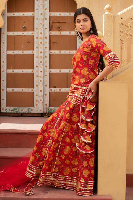 Buy Pomcha Jaipur Red Cotton, Net Ruffles Round Neck Printed Kurta Set With Dupatta Online at Aza Fashions Buy_Pomcha Jaipur_Red Cotton, Net Ruffles Round Neck Printed Kurta Set With Dupatta _Online_at_Aza_Fashions