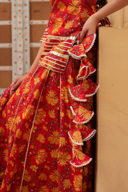 Shop Pomcha Jaipur Red Cotton, Net Ruffles Round Neck Printed Kurta Set With Dupatta Online at Aza Fashions Shop_Pomcha Jaipur_Red Cotton, Net Ruffles Round Neck Printed Kurta Set With Dupatta _Online_at_Aza_Fashions