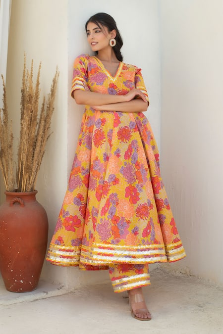 Pomcha Jaipur Yellow Cotton, Net Tassels V-neck Floral Print Anarkali Kurta Set at Aza Fashions Pomcha Jaipur_Yellow Cotton, Net Tassels V-neck Floral Print Anarkali Kurta Set _at_Aza_Fashions