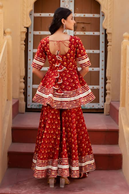 Pomcha Jaipur Red Cotton, Net Embroidery, Pom-poms V-neck Printed Kurta Set With Sharara Online at Aza Fashions Pomcha Jaipur_Red Cotton, Net Embroidery, Pom-poms V-neck Printed Kurta Set With Sharara _Online_at_Aza_Fashions