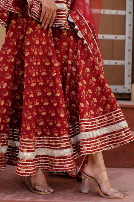 Shop Pomcha Jaipur Red Cotton, Net Embroidery, Pom-poms V-neck Printed Kurta Set With Sharara Shop_Pomcha Jaipur_Red Cotton, Net Embroidery, Pom-poms V-neck Printed Kurta Set With Sharara