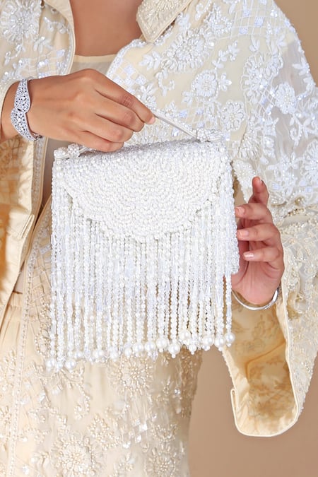 Adora By Ankita Cream Pearls, Crystals Ivory Fringed Clutch Bag Online at Aza Fashions Adora By Ankita_Cream Pearls, Crystals Ivory Fringed Clutch Bag _Online_at_Aza_Fashions