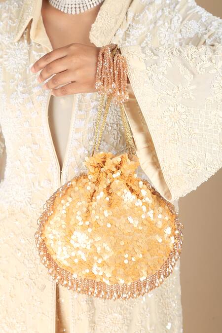 Adora By Ankita_Gold Sequins, Tassels Amber Flapper Potli Bag _Online_at_Aza_Fashions