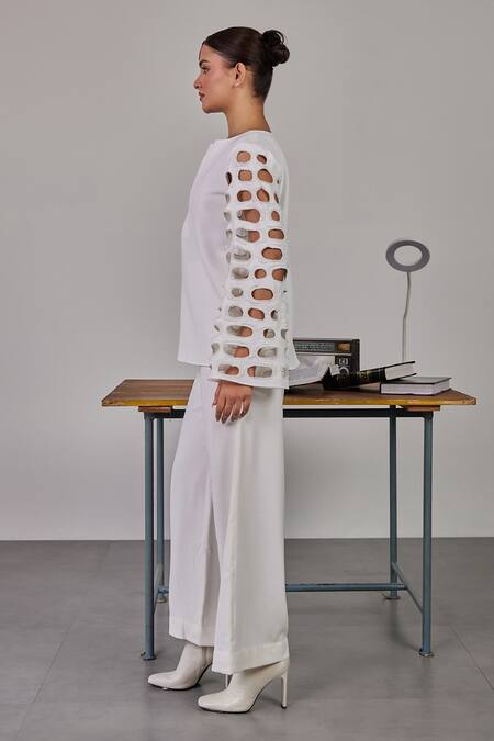 Maenaam_Ivory Crepe V-neck Nora Cut Out Top_at_Aza_Fashions