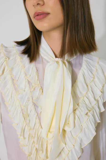 Koai Off White Chiffon Open Neck Frill Bow Tie Top at Aza Fashions Koai_Off White Chiffon Open Neck Frill Bow Tie Top _at_Aza_Fashions