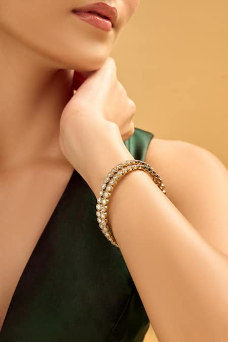 Shop Nazaakat By Samara Singh Gold Plated Crystals And White Beaded Bangles Set Online at Aza Fashions Shop_Nazaakat By Samara Singh_Gold Plated Crystals And White Beaded Bangles Set _Online_at_Aza_Fashions