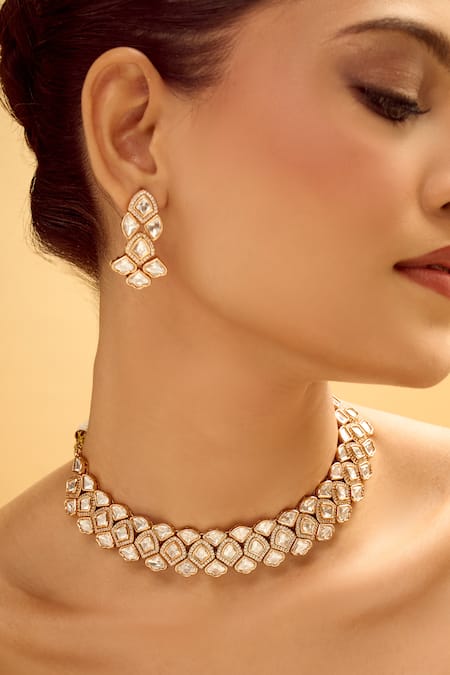 Nazaakat By Samara Singh Gold Plated Stones And White Embellished Jewellery Set at Aza Fashions Nazaakat By Samara Singh_Gold Plated Stones And White Embellished Jewellery Set _at_Aza_Fashions