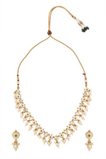 Shop Nazaakat By Samara Singh Cream Pearls Creme And Green Brass Jewellery Set at Aza Fashions Shop_Nazaakat By Samara Singh_Cream Pearls Creme And Green Brass Jewellery Set _at_Aza_Fashions