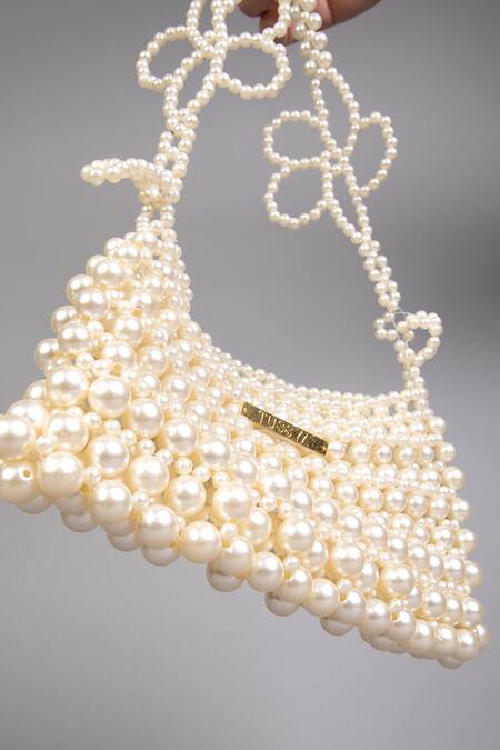 Tussya_White Pearls Curved Handbag With Detachable Sling_Online_at_Aza_Fashions