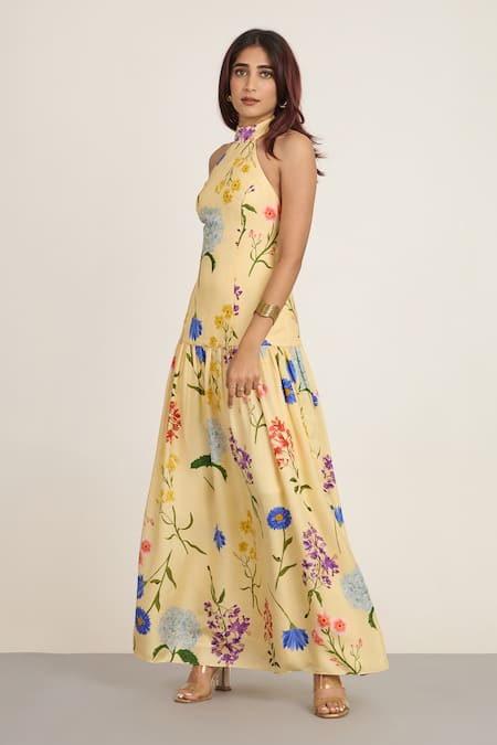 Buy_The Whole Nine Yards_Yellow Silk Halter Neck Floral Printed Maxi Dress _Online_at_Aza_Fashions