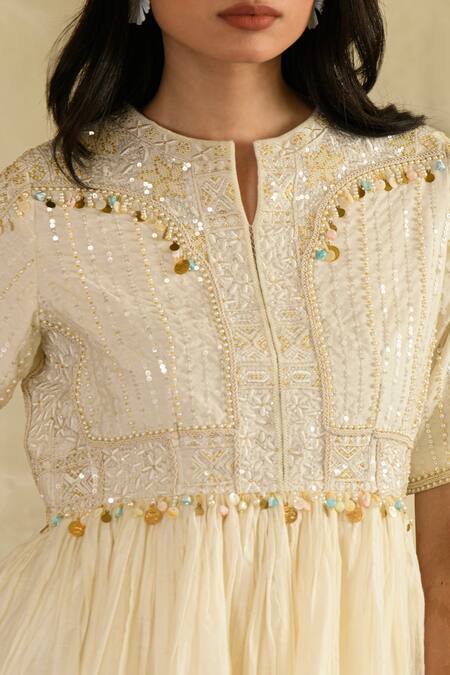 Buy_Saahiil Kapoor_Ivory Chanderi Sequins, Beads, Tassels Round Neck Embellished Peplum Kurta Set _Online_at_Aza_Fashions