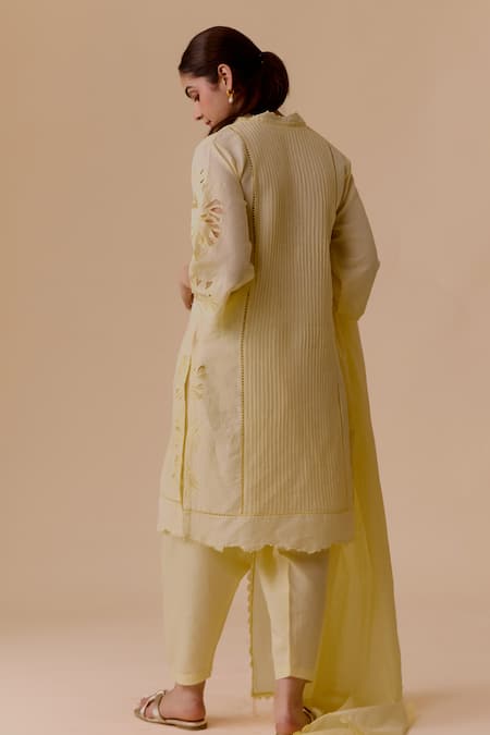 Shop Bunka Yellow Cotton Cut Work V-neck Floral Kurta Set at Aza Fashions Shop_Bunka_Yellow Cotton Cut Work V-neck Floral Kurta Set _at_Aza_Fashions