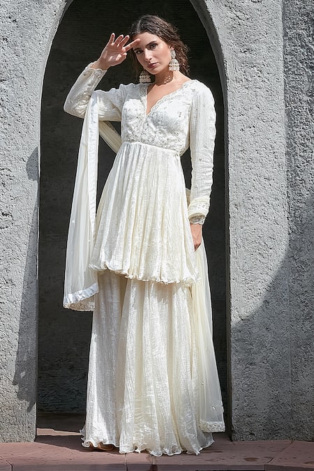Priyanka Jain_Ivory Embroidery V-neck Crinkle Sharara Set _at_Aza_Fashions