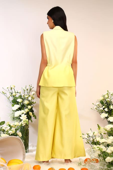 Shop_Sakshi Khetterpal_Yellow Silk, Citrus Burst Sleeveless Blazer And Flared Pants Set _at_Aza_Fashions